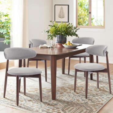 Ringsted grey linen dining chairs with solid wood legs at a dining table