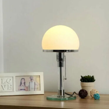 Borgå mushroom table lamp with glass shade on a table