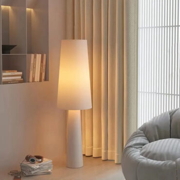 Halden cream tapered floor lamp with fabric cone shade