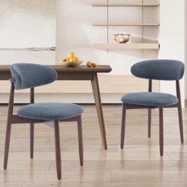 Ringsted blue linen dining chairs with solid wood legs at a dining table