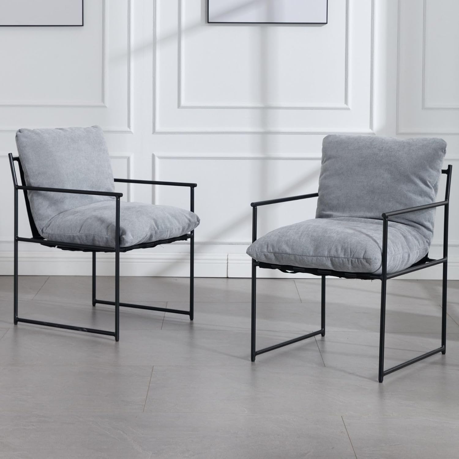 Two Särö grey chenille dining chairs with cross-strap backrest and metal frame