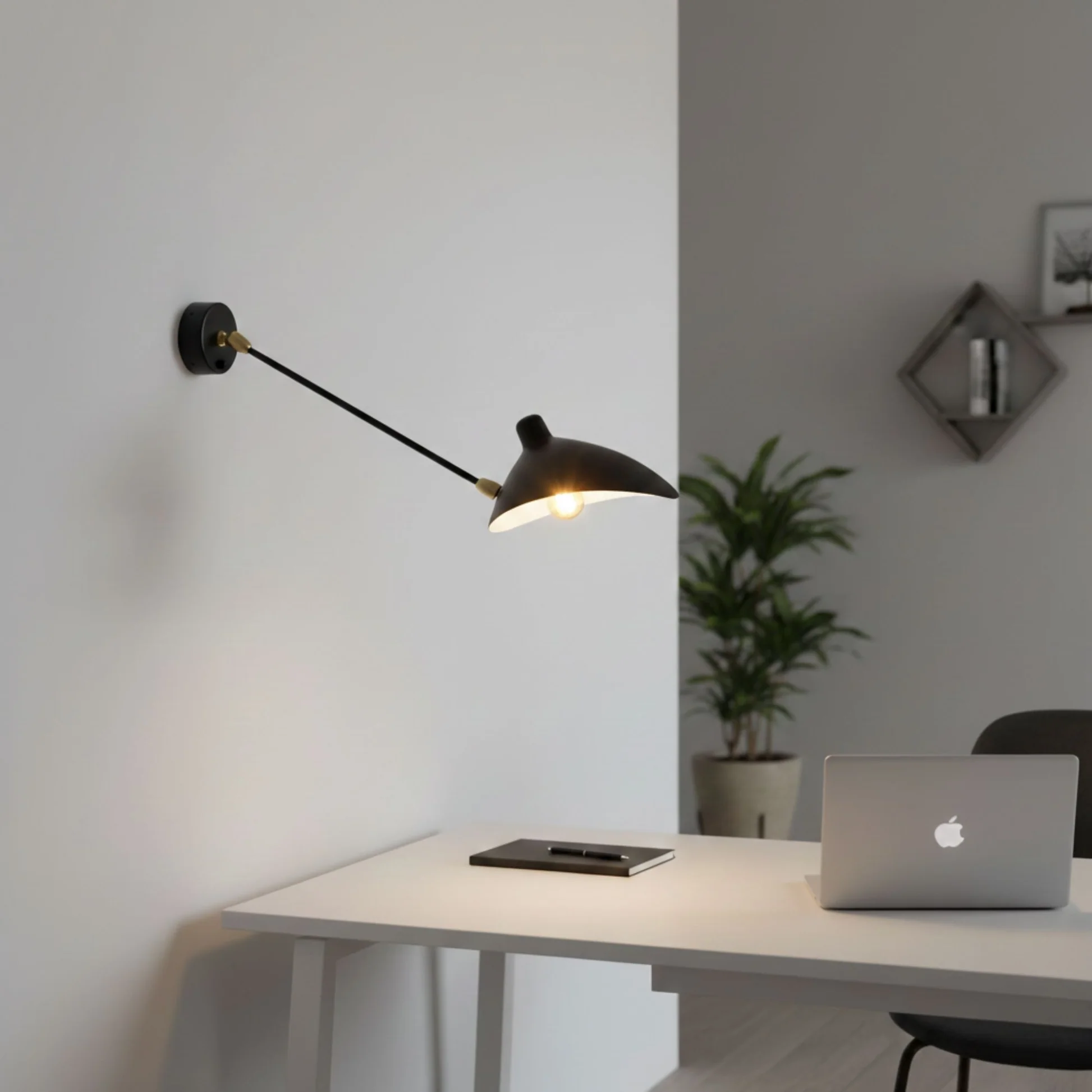 Vega adjustable black aluminium wall light above a desk